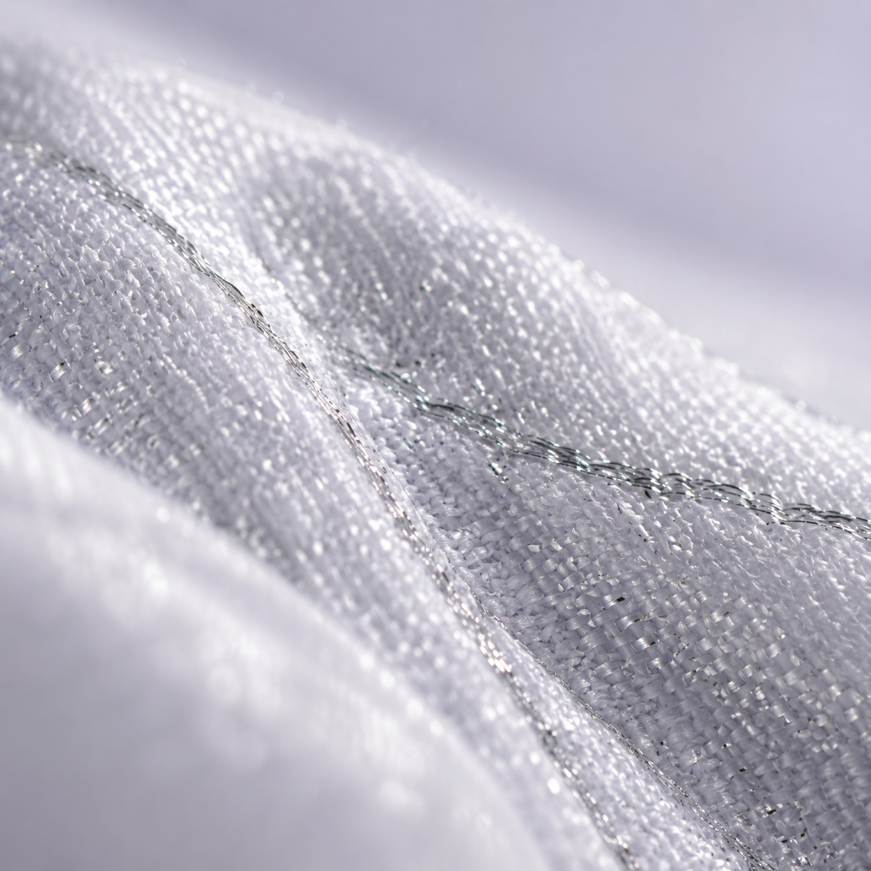 Macro view of silver-infused fabric